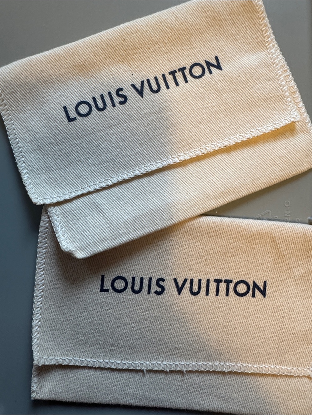 2 pc. Louis Vuitton Cream Dust Bags with Navy Logo